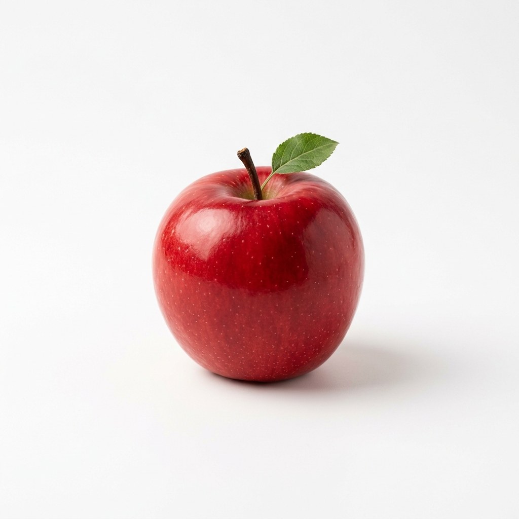 A single red apple on a clean white background, studio softbox lighting, commercial product photography